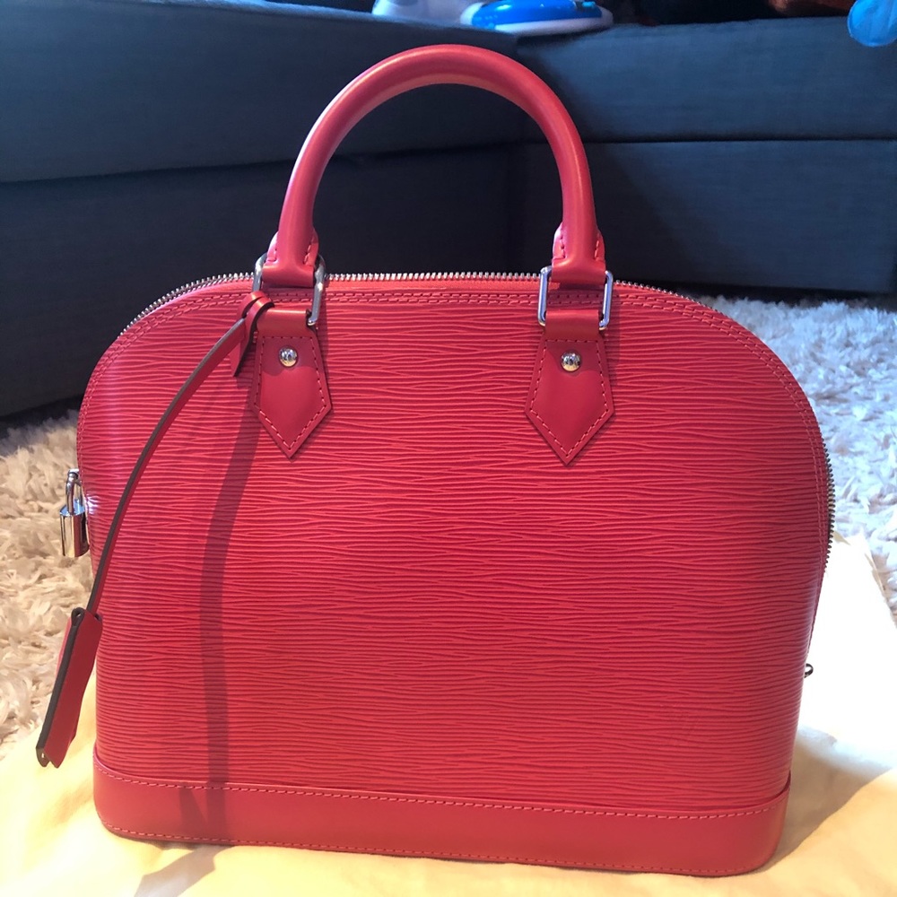 Louis Vuitton Epi leather Alma PM bag